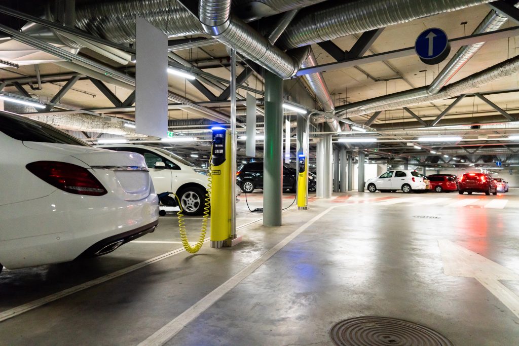 Parking garage of a residential tower with EV chargers